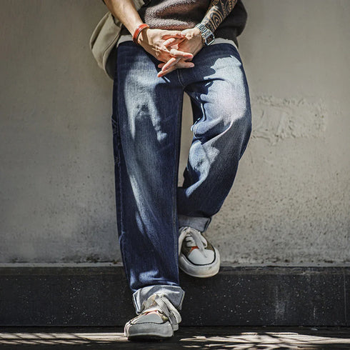 Retro blue logging jeans in washed denim, loose fit, non-elastic waist, men's daily wear.